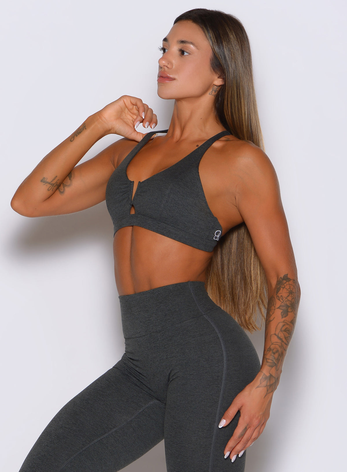 Supportive side profile with slim straps and a sleek charcoal silhouette