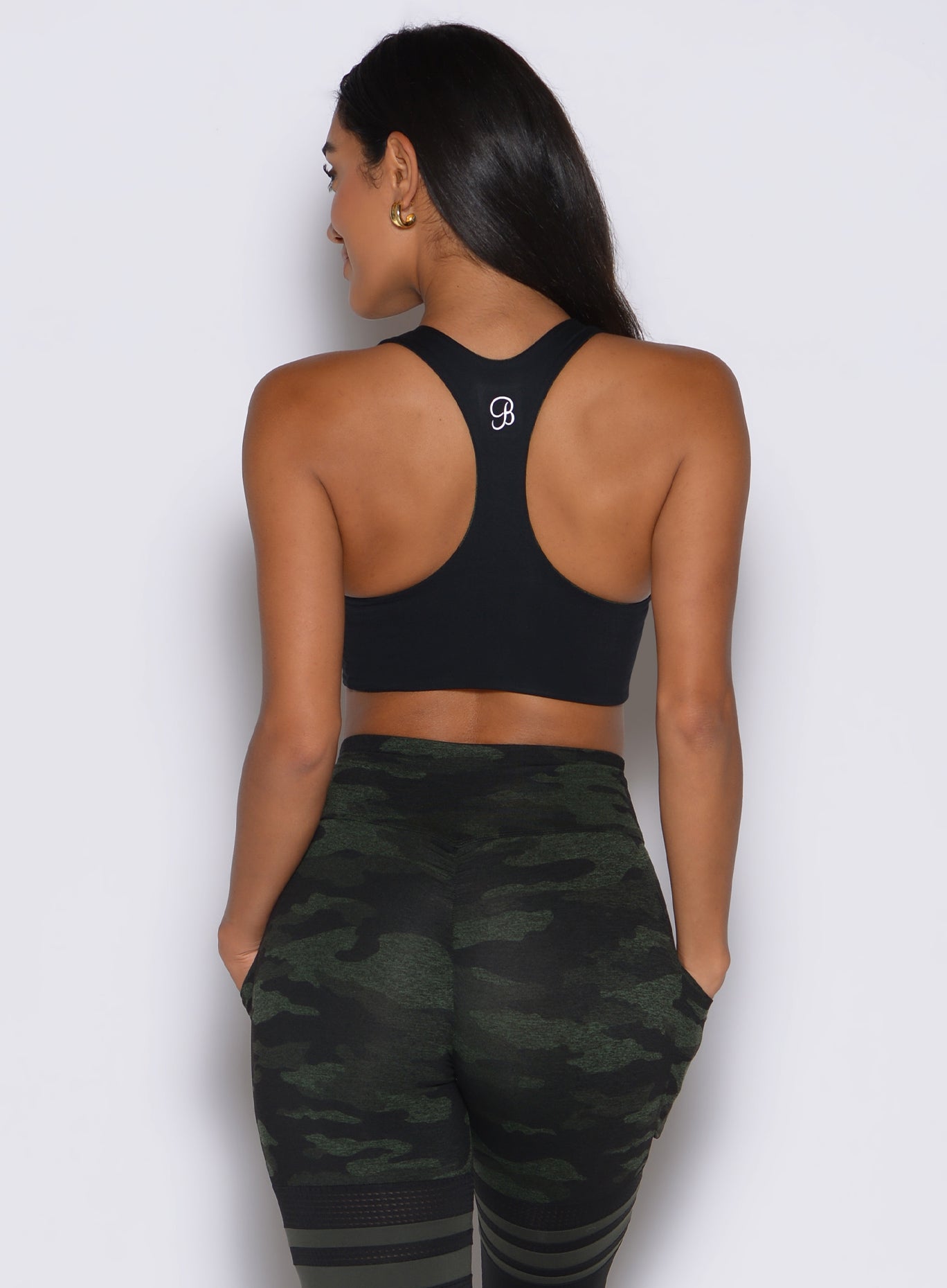 Back view of the Green/Black Camo Reversible Tank Bra featuring a racerback and seamless fit.