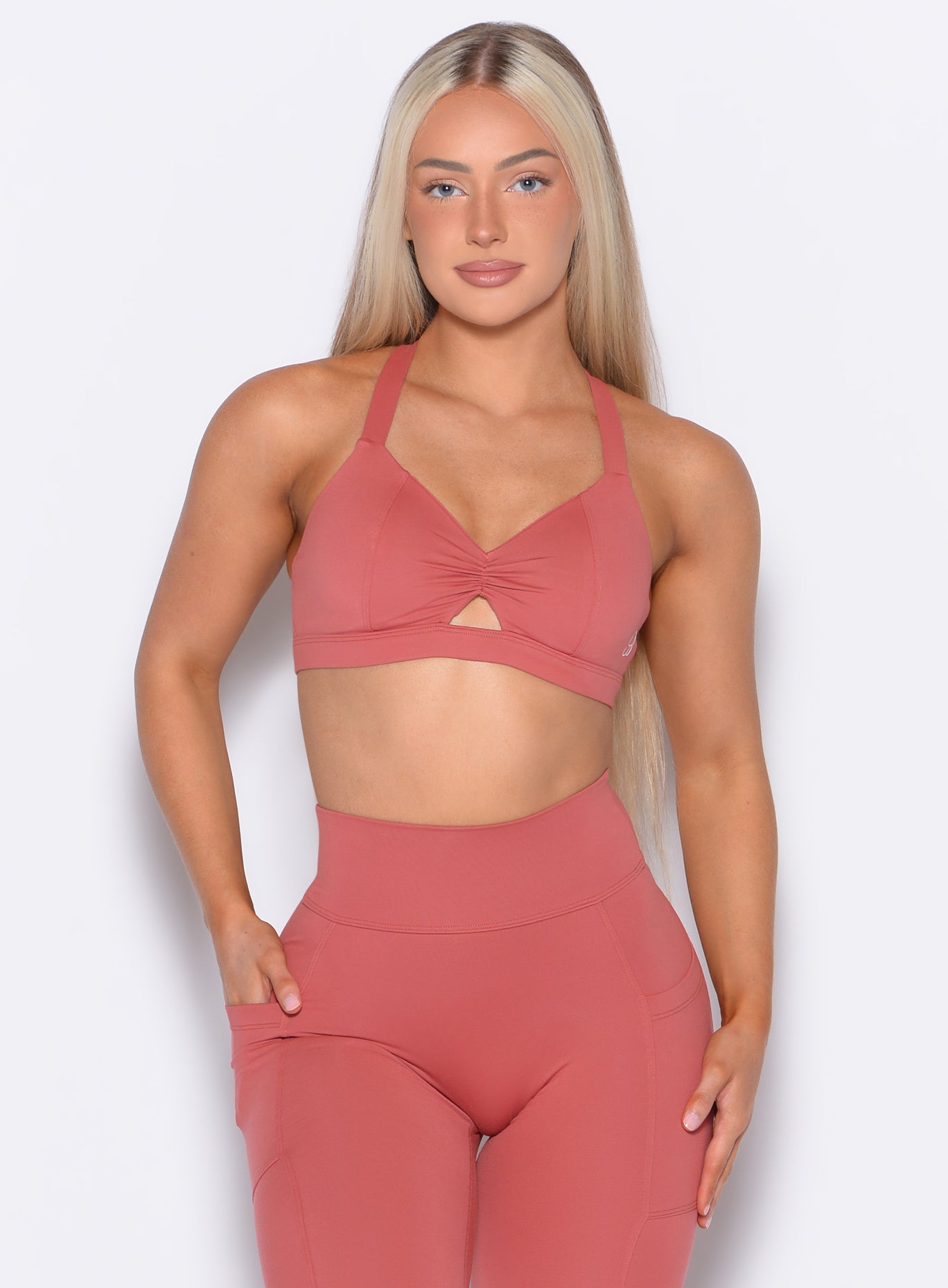 Front profile view of our model wearing the Sweetheart Sports Bra in Terracotta color