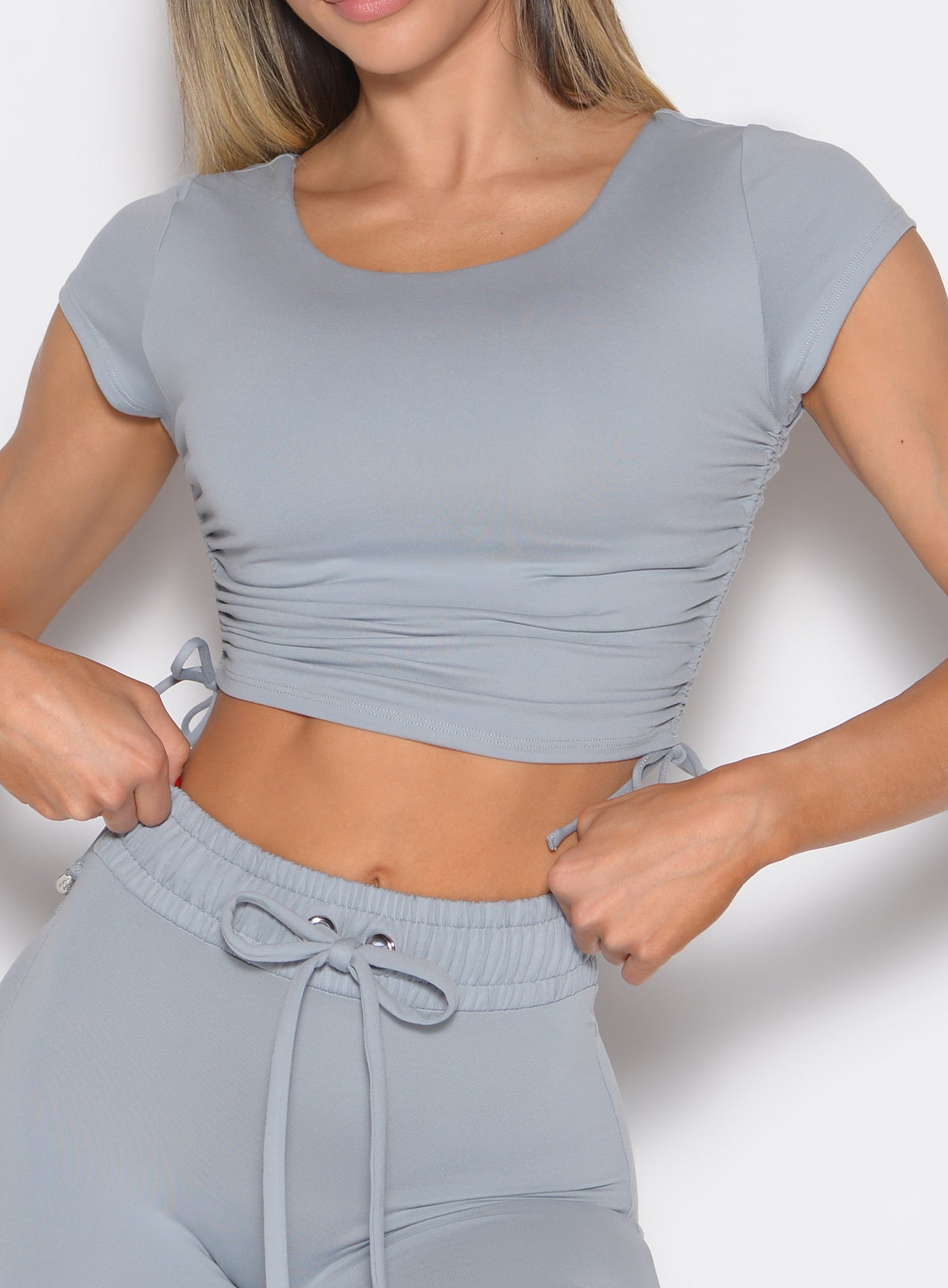 Sculpting Quarry Scrunch Fit Bra-Tee featuring premium ribbed fabric for high-impact gym power.