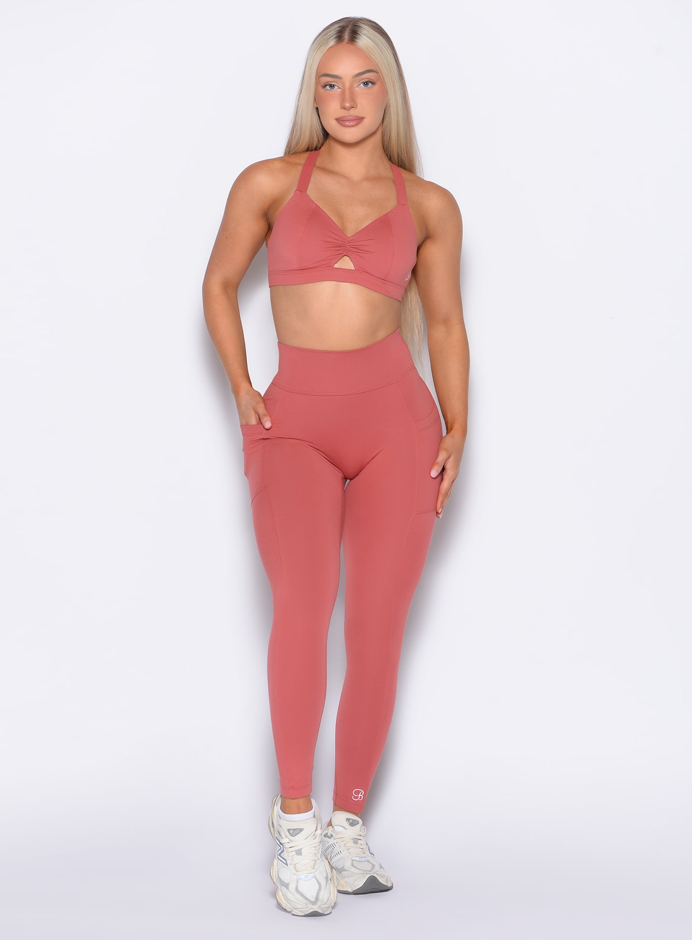 Terracotta Define Leggings with high-waisted support and side pockets for a sculpted gym look.