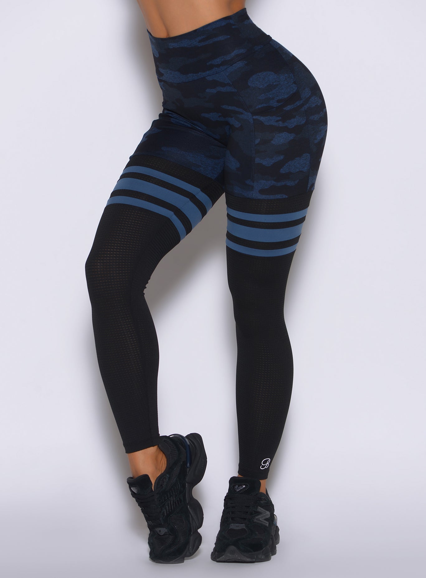 Blue Black Camo Scrunch Thigh-Highs featuring a high-waisted, sculpting fit with side pockets.