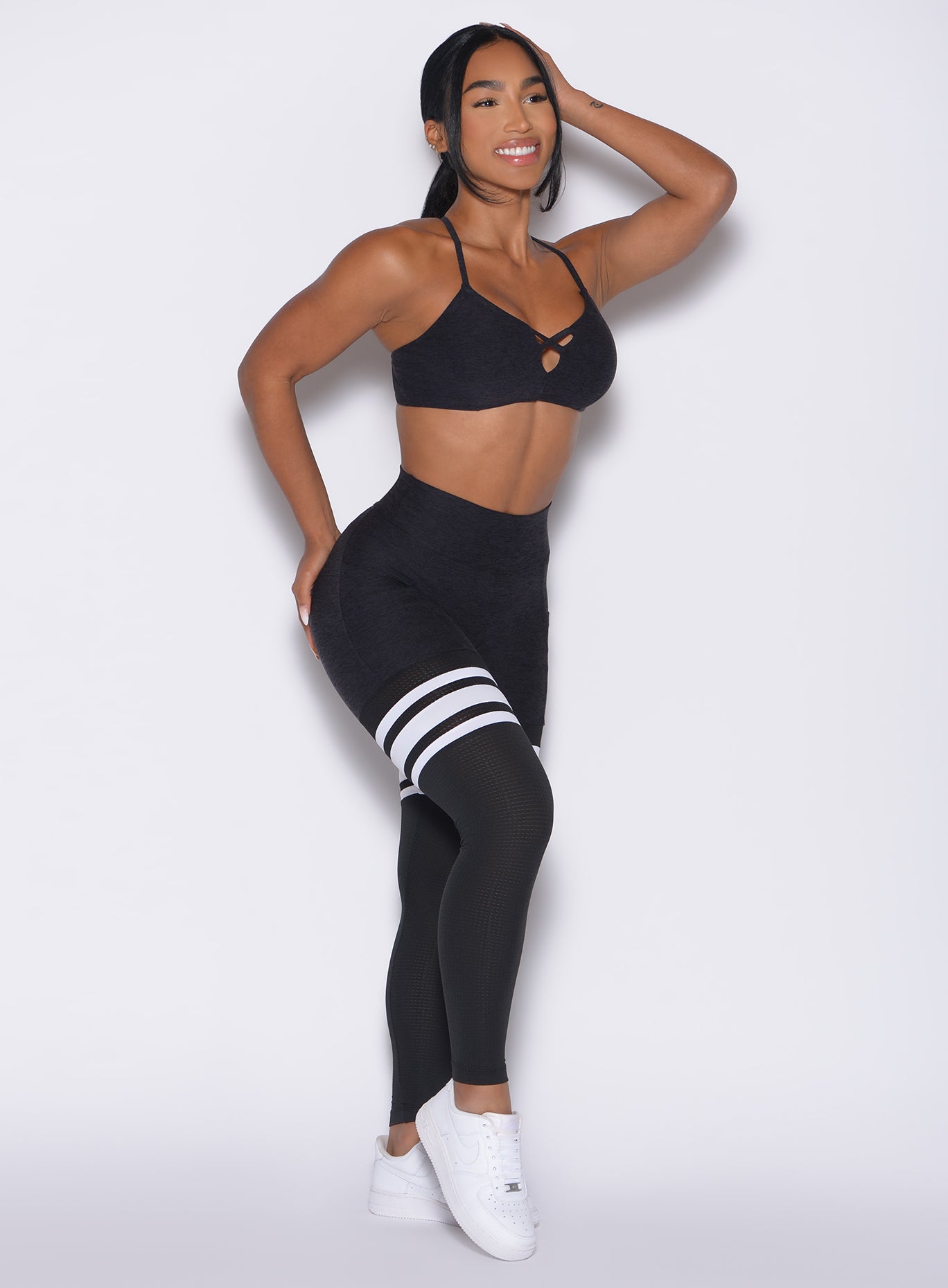 Heathered Black Scrunch Thigh-Highs with cooling mesh panels for high-performance gym training.
