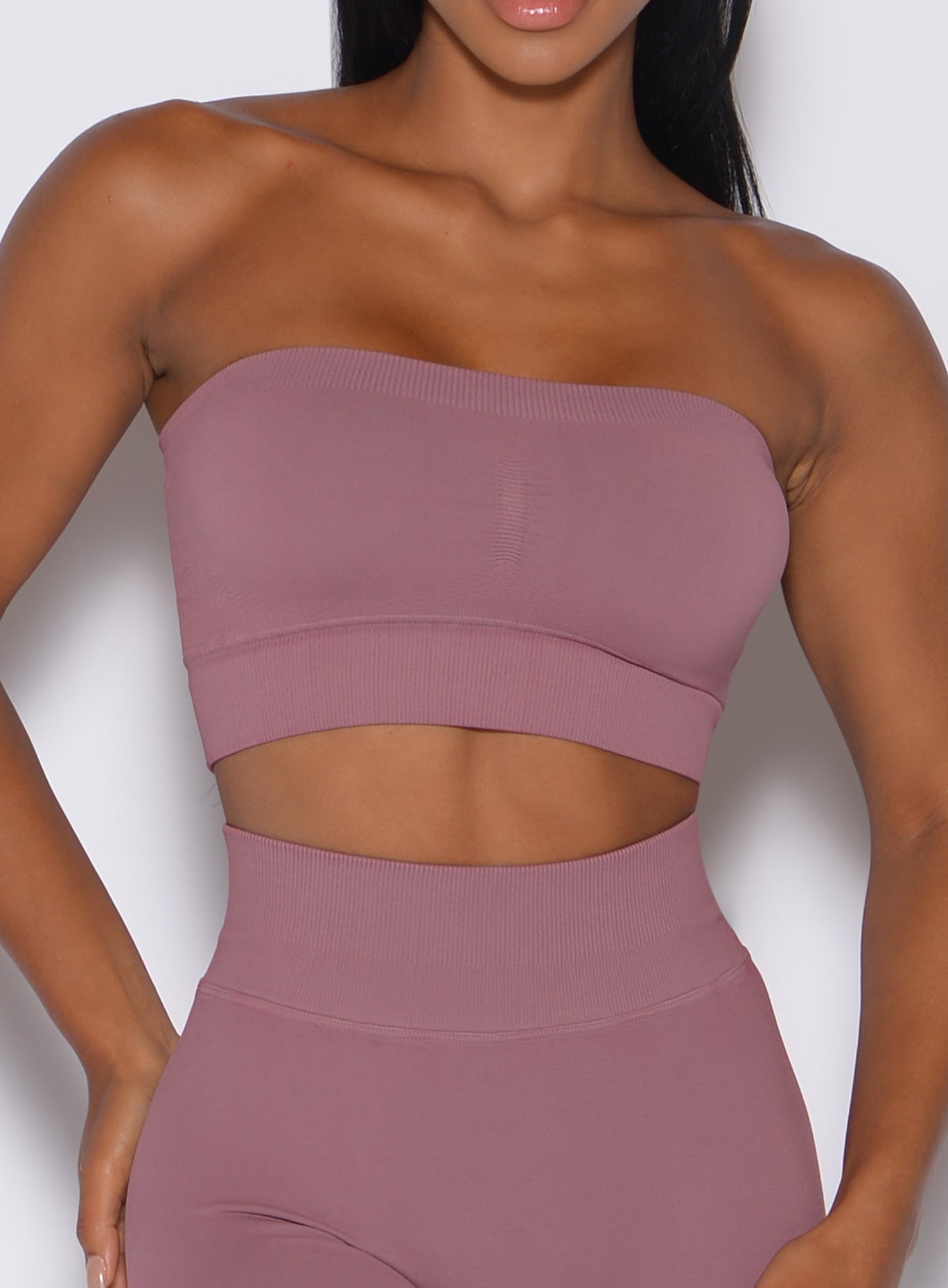 zoomed in front view of a model showing our seamless bandeau in satin color