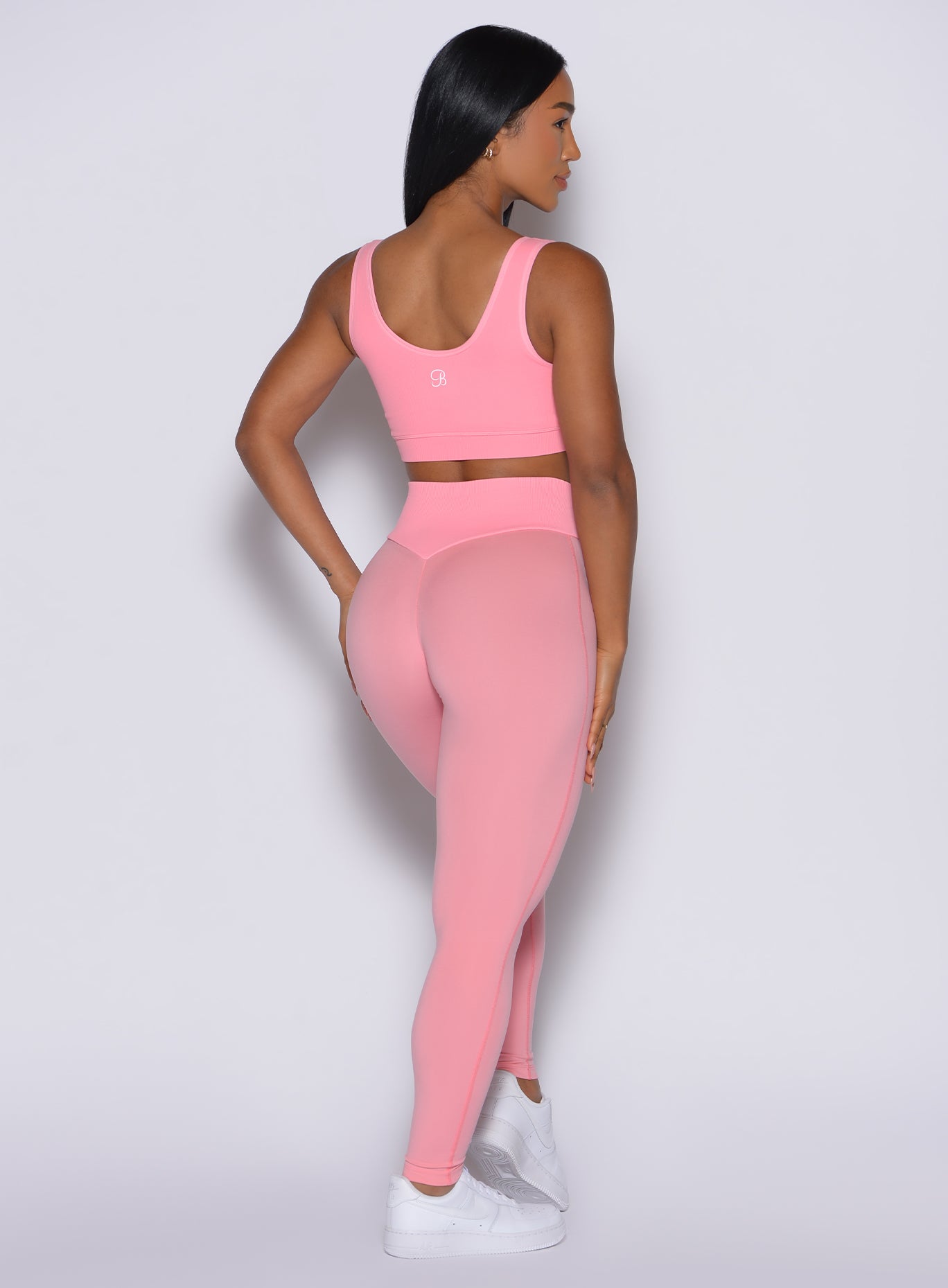 Peach Burst Figure Leggings featuring a seamless ribbed waistband and flattering booty contour.