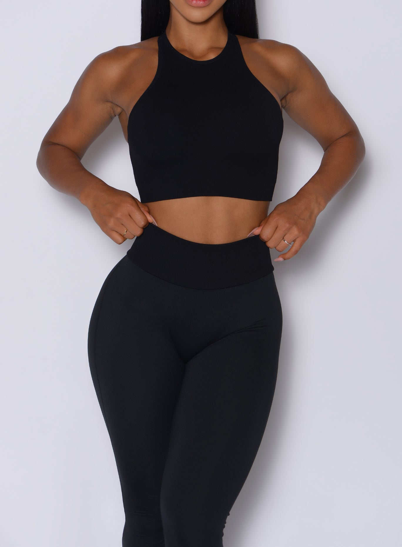 Black Figure Scrunch Leggings with a snatched, seamless ribbed waistband for elite gym performance.
