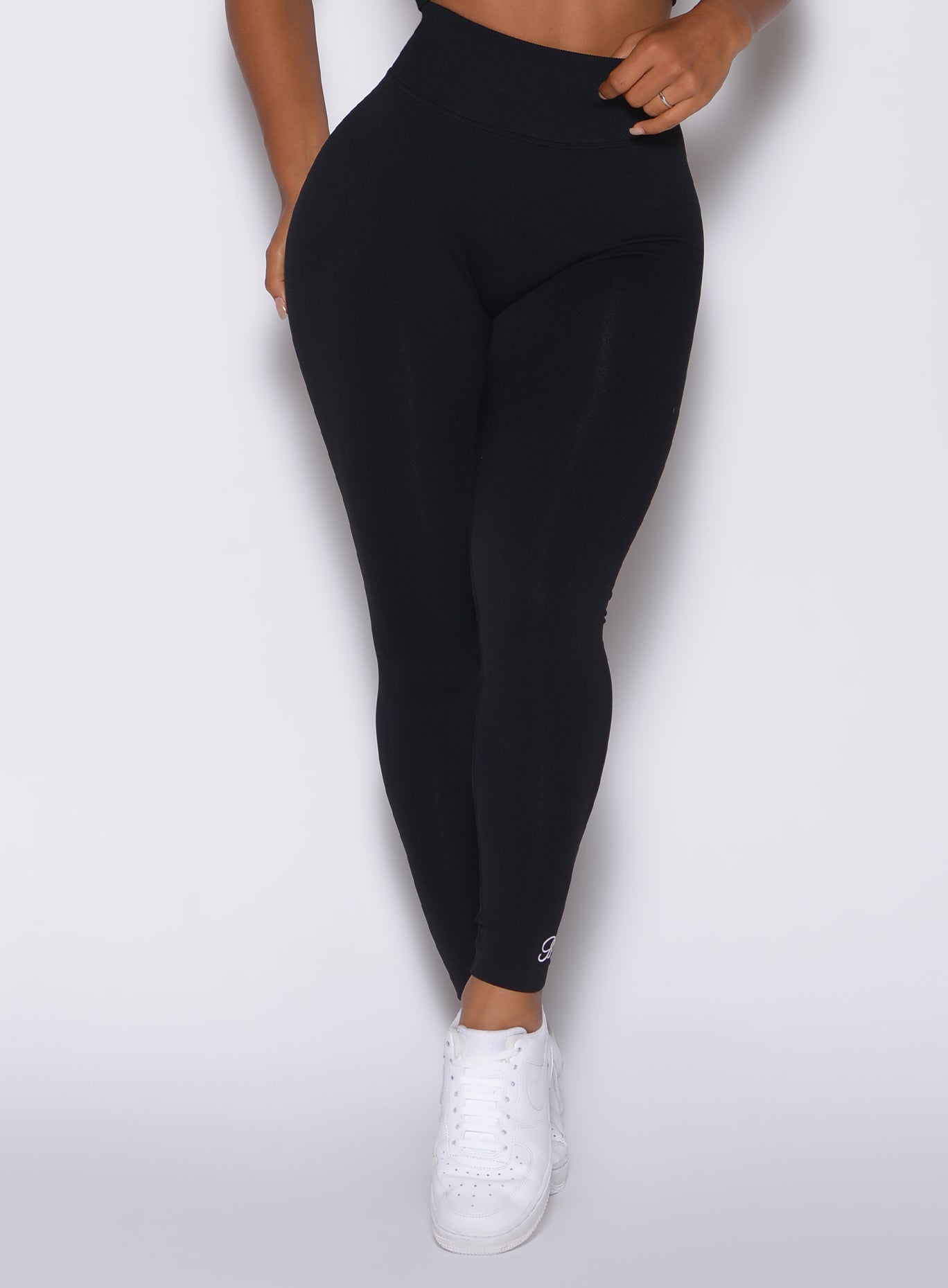 zoomed in front view of our black cheeky seamless leggings