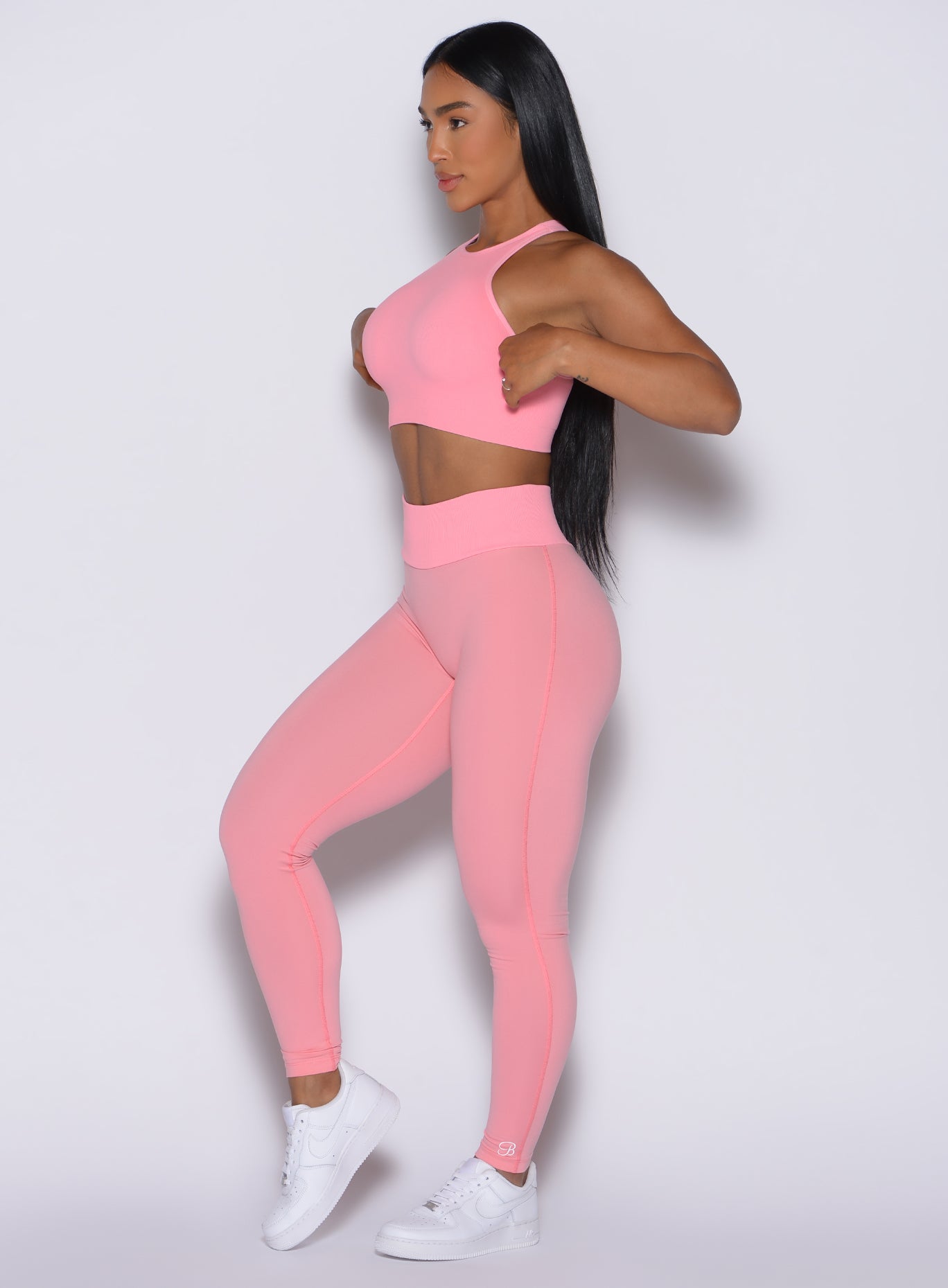 Peach Burst Figure Scrunch Leggings featuring a seamless ribbed waistband for a snatched gym look.