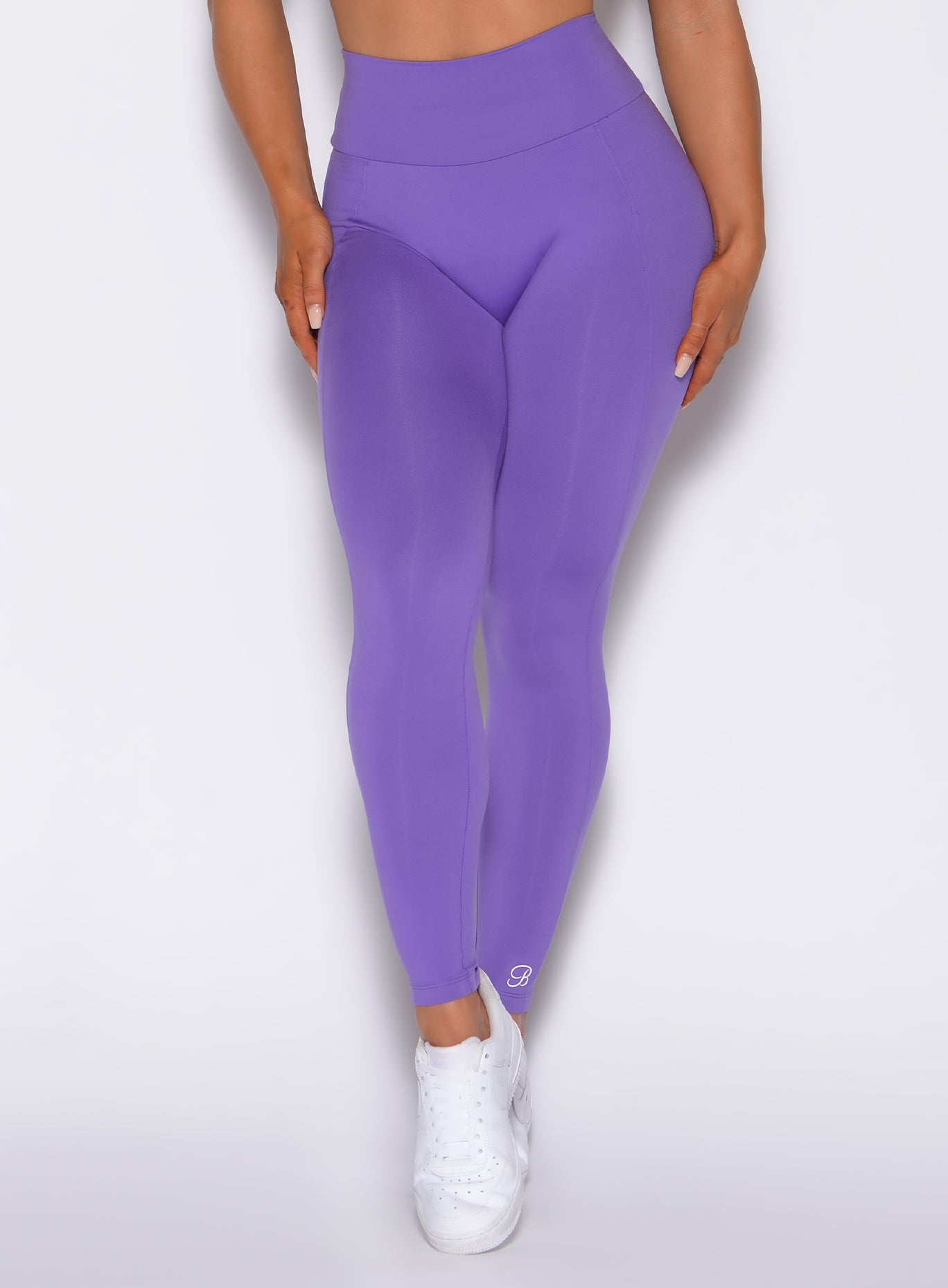 zoomed in front view of our shape leggings in royal purple color