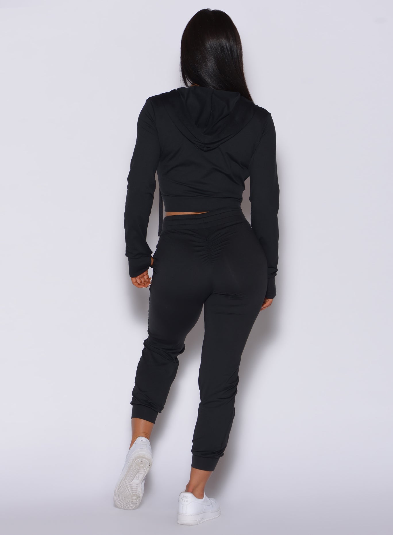 Sculpting black Cozy Joggers with signature scrunch butt and side pockets for lounging.