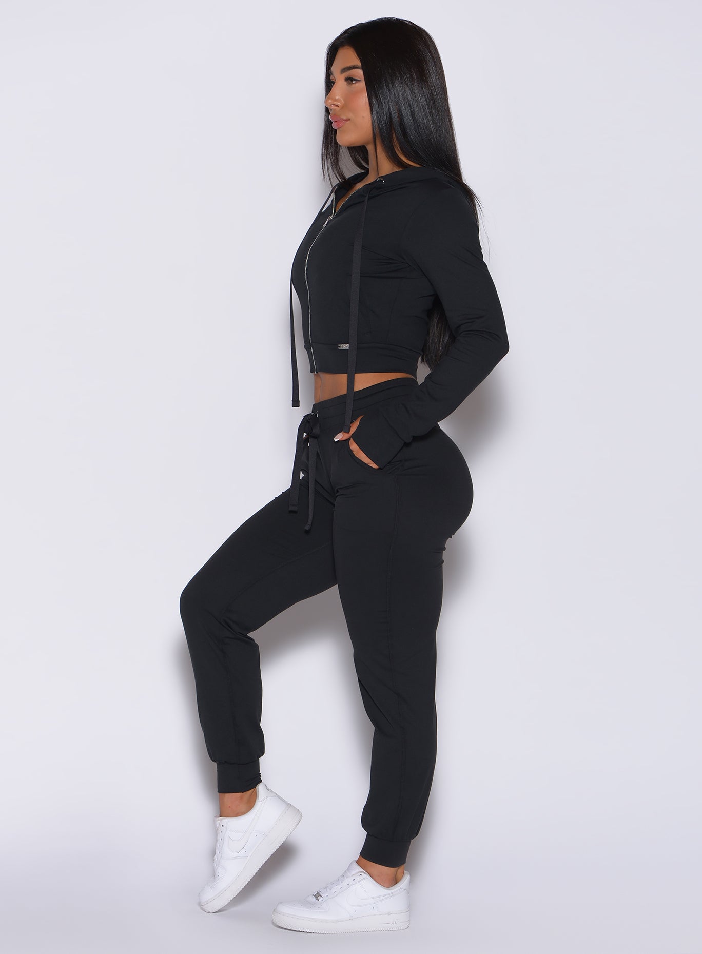 Tapered black Cozy Joggers with a high-waisted elastic band for a soft, sculpting lounge fit.