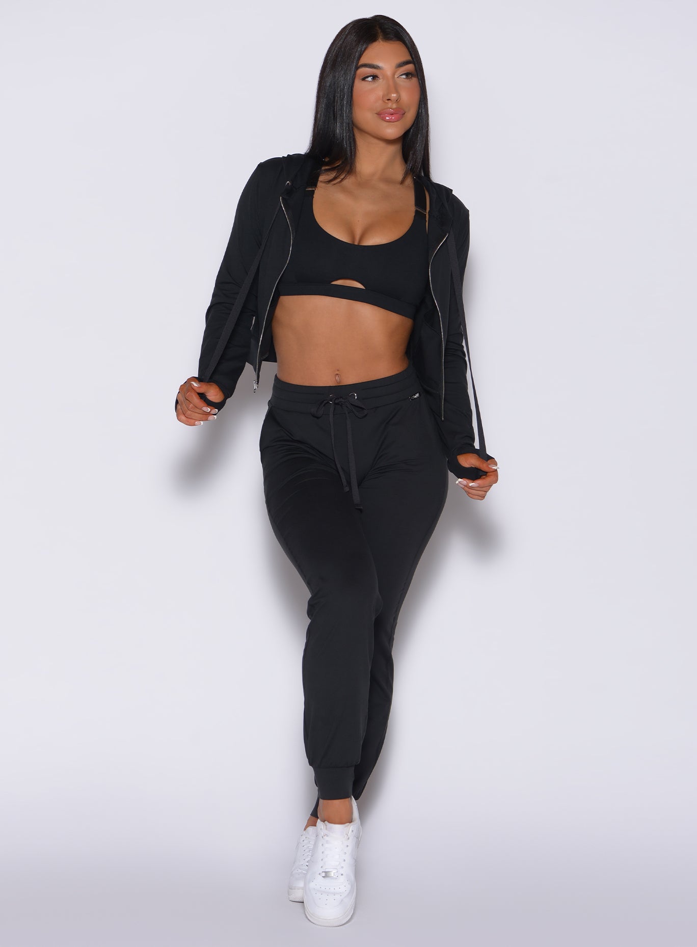 Sculpting black Signature Zip Front Jacket paired with front-tie Cozy Joggers for the gym.