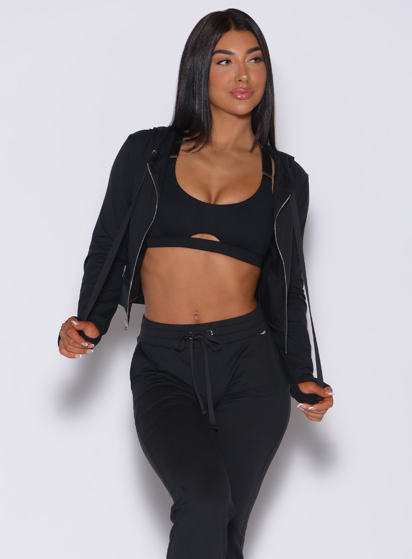 Black Signature Jacket in a full-zip cropped fit, styled with matching lounge joggers.