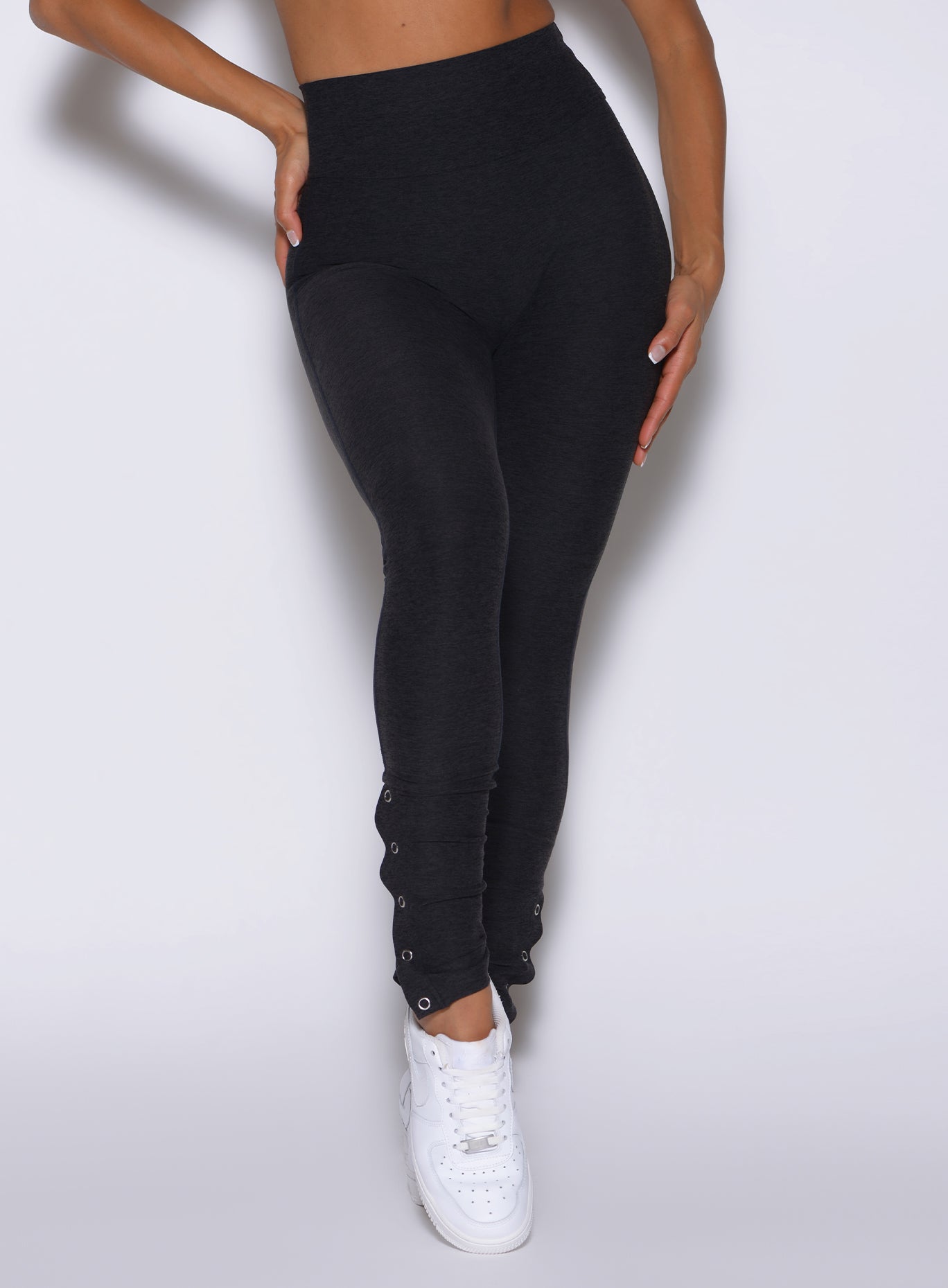Heathered Black Snap Flare Leggings featuring adjustable side snaps for a custom workout look.