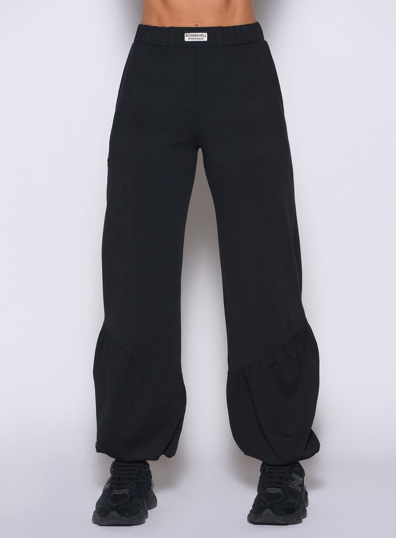 Tapered black Society Joggers with sculpted seaming, built for performance-driven gym-to-street style.