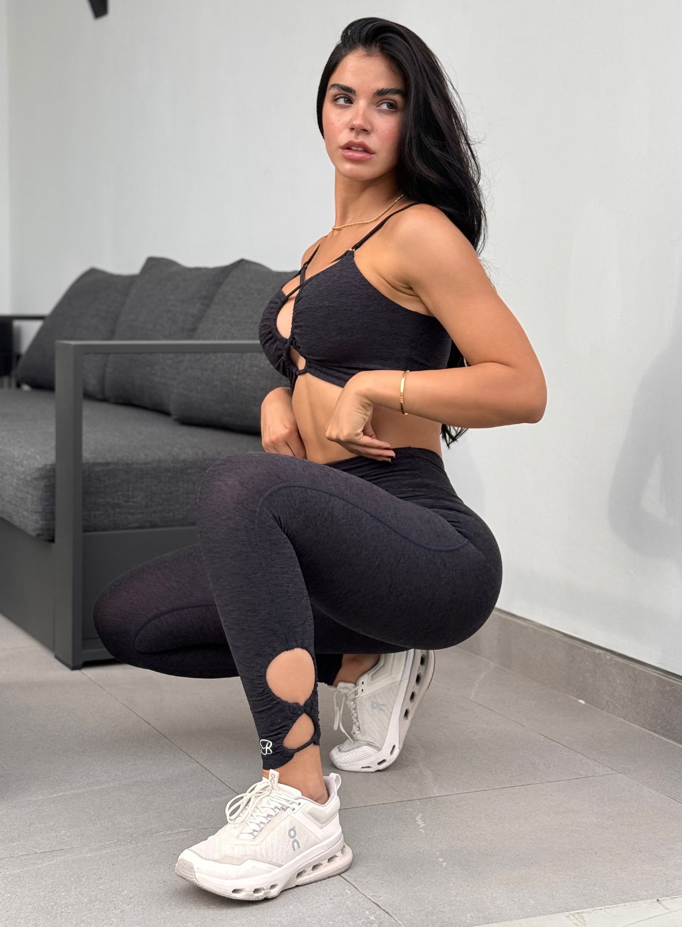 Heathered black Form Flex Leggings in a low athletic squat, featuring a flattering scrunch butt.