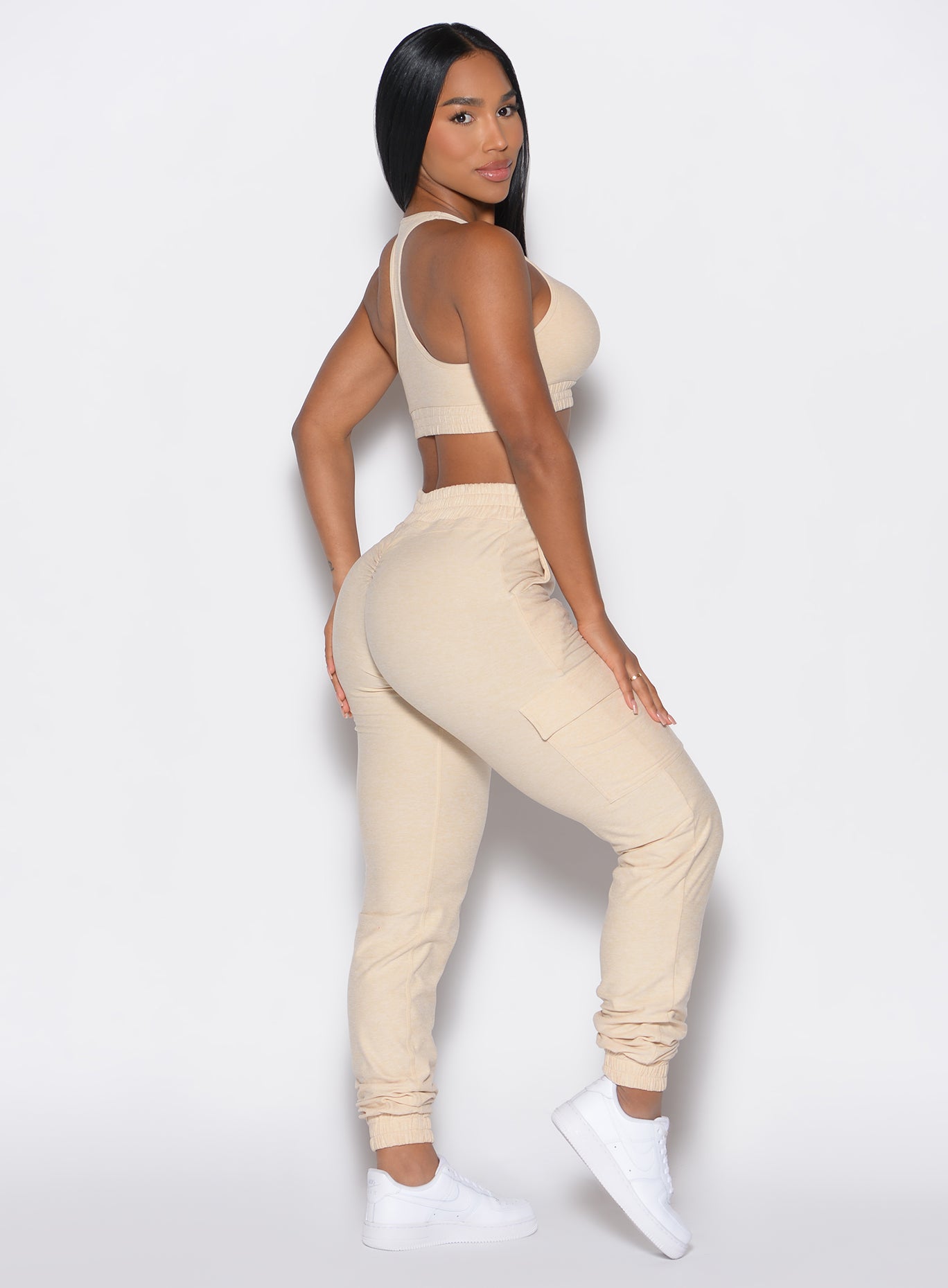 Vanilla Cloud Comfort Joggers with cargo pockets and scrunched cuffs for a luxe lounge aesthetic.