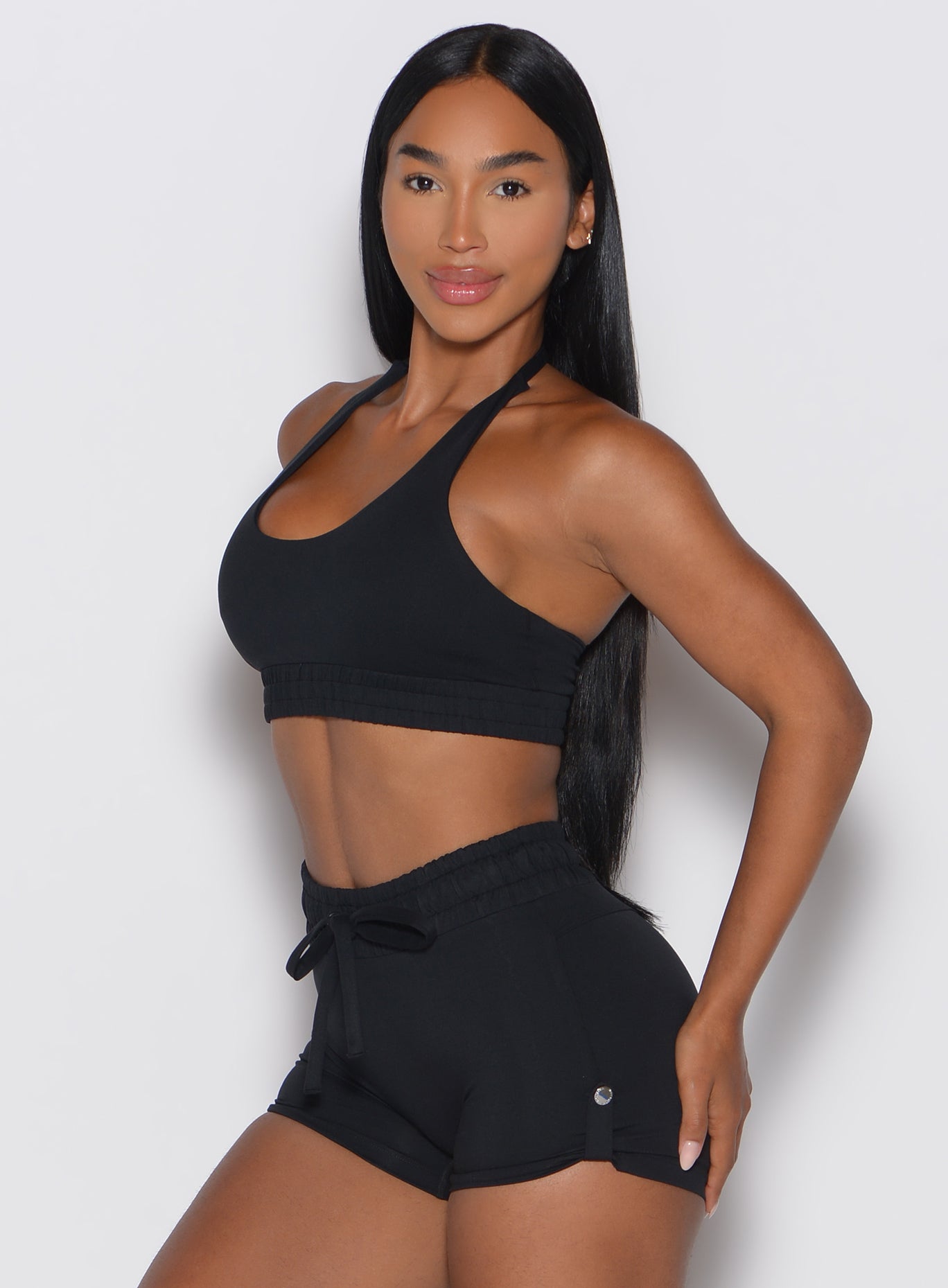 Black Trailblaze Sports Bra featuring a scooped neckline and cinched underbust for a sculpting fit.