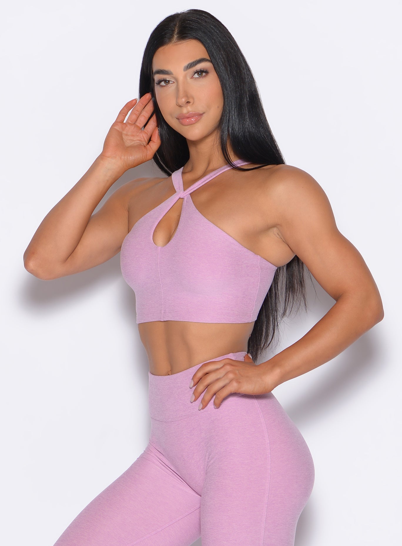 Fondant pink Twist Up Bra with a chic criss-cross neck and keyhole for yoga or gym.
