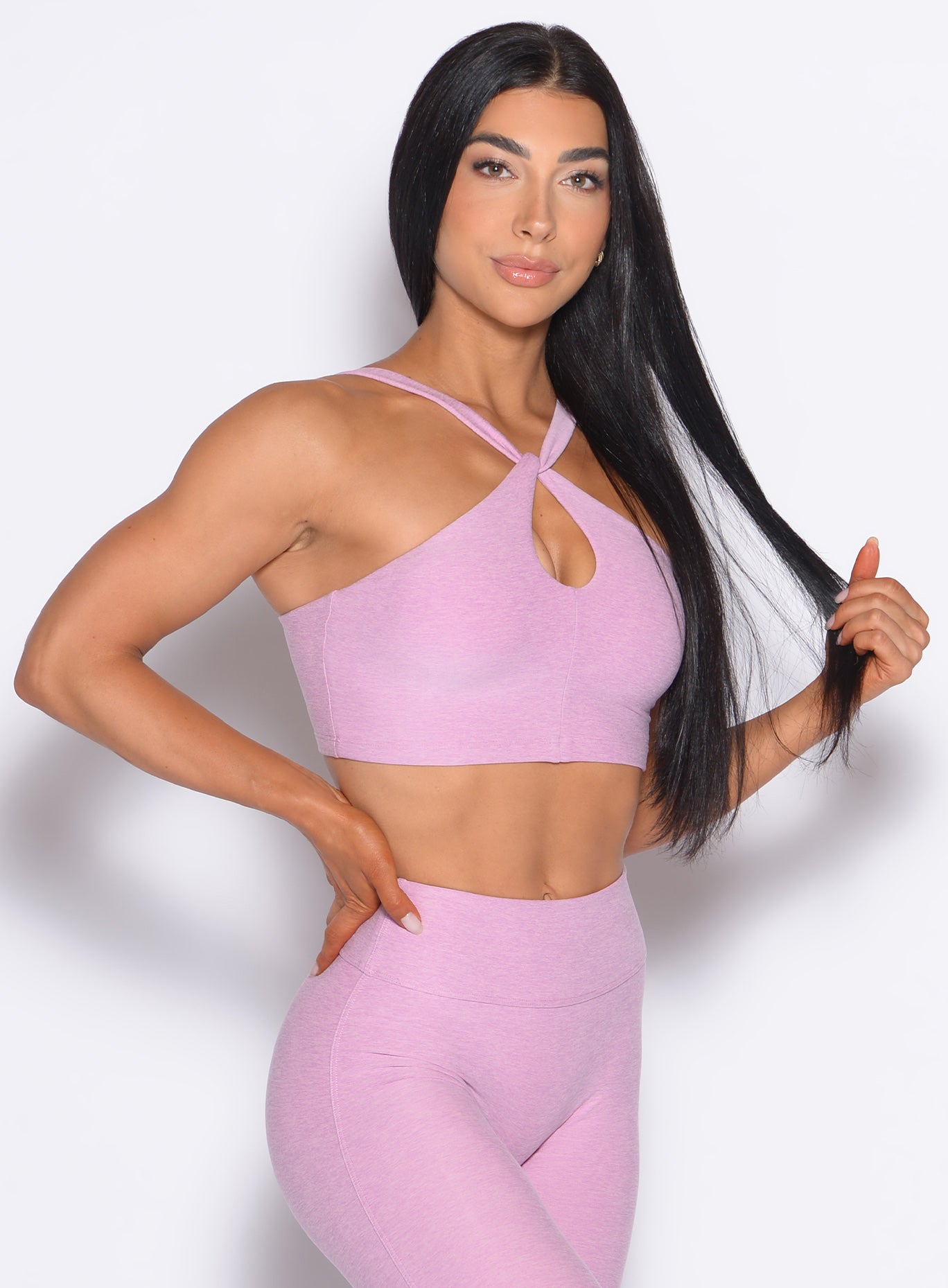 Twist Up Bra in Fondant pink; a longline gym top with crisscross neck and keyhole detail.