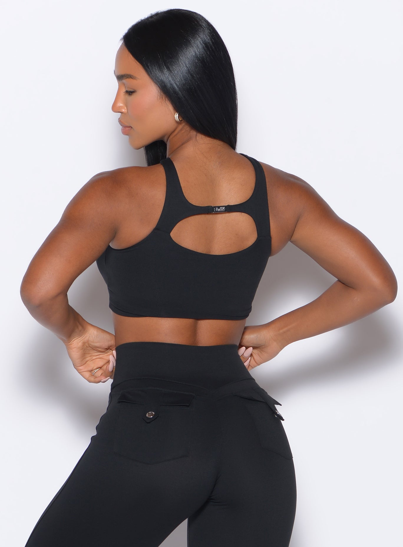 Black Two Way Bra featuring a supportive strappy back and sculpting fit for high-impact training.