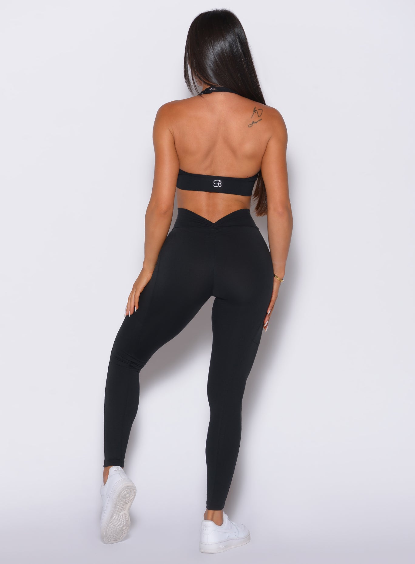 Black V Back Leggings featuring a sculpting booty scrunch and high-waist fit for gym days.