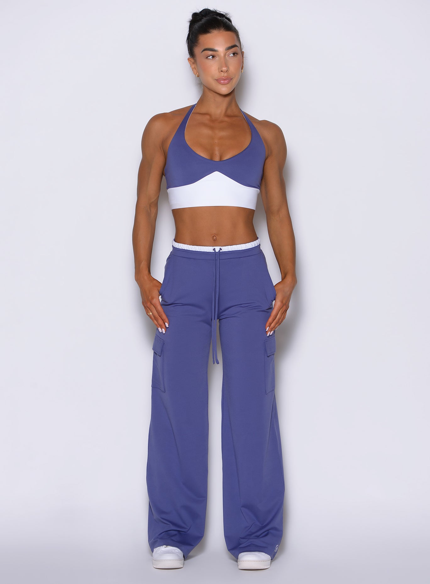 Front view of model wearing Bombshell Sportswear wide leg joggers in Future Dusk color, featuring relaxed flowy fit, adjustable drawstring waistband, and soft lightweight fabric for everyday wear
