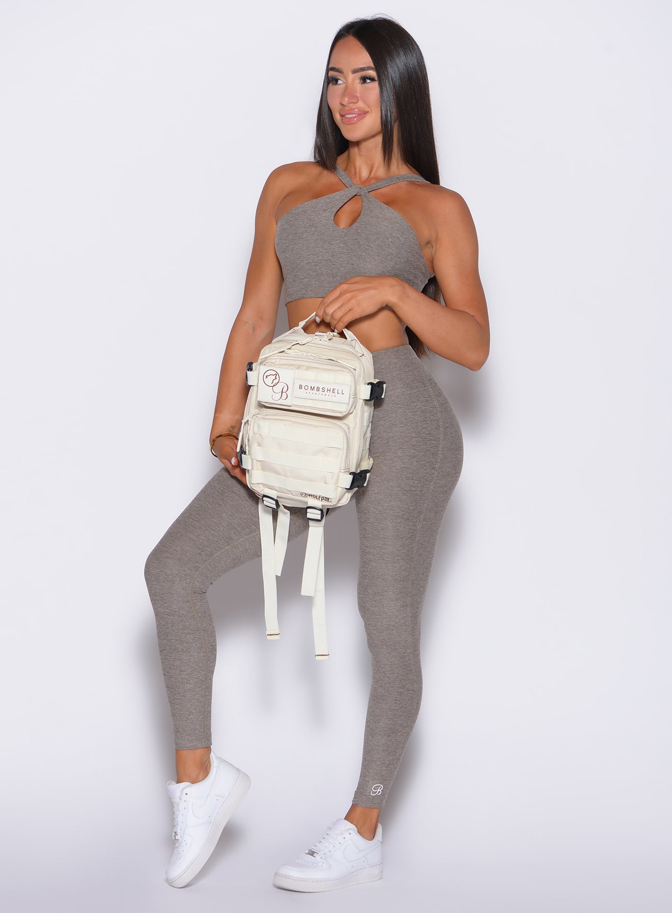 Smoked Taupe Bombshell Bunny Leggings styled with a gym backpack for an active, on-the-go look.