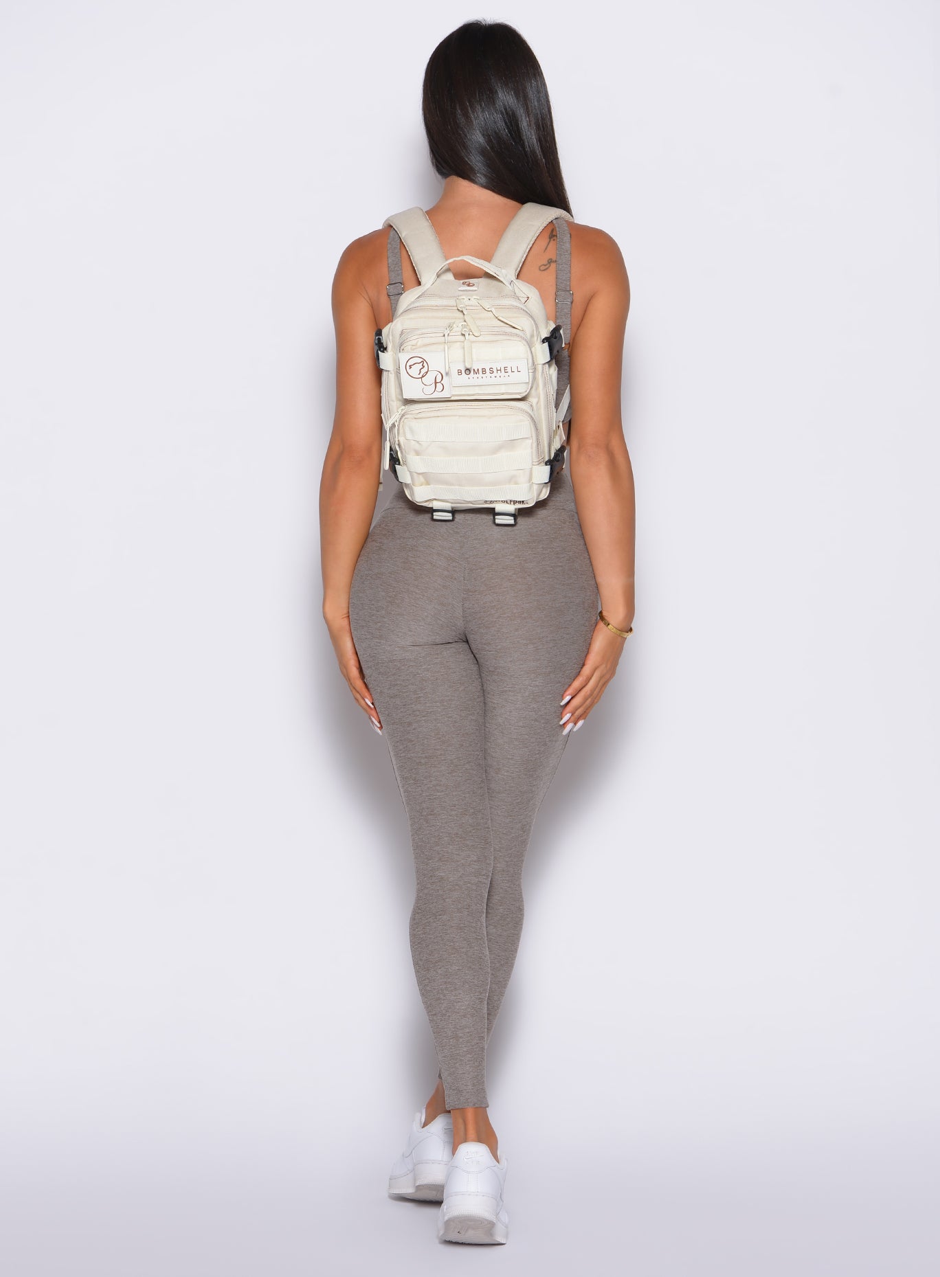 Smoked Taupe Bombshell Bunny Leggings paired with a backpack for a high-performance gym commute.