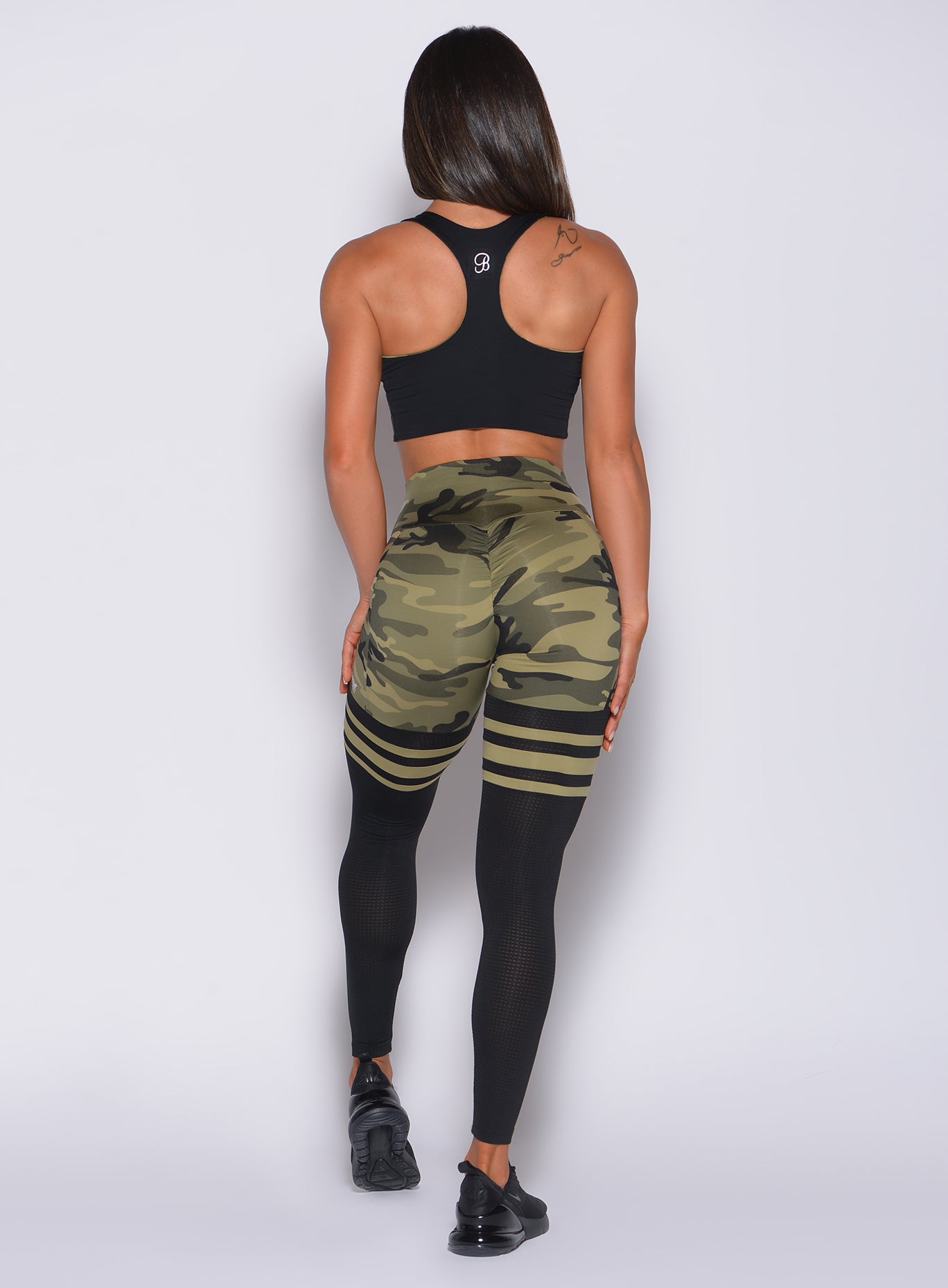 Sculpting Green Camo Scrunch Thigh-Highs with breathable mesh and a squat-proof fit.