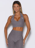 front view of a model wearing the Ace Active Top in Champion Gray color
