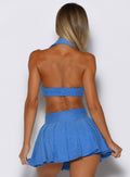 model wearing the Ace Active Top in Legacy Blue color captured from the back side 