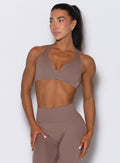 Cocoa Ace Bra with curved neckline support and smooth compression fit for strength-focused workouts