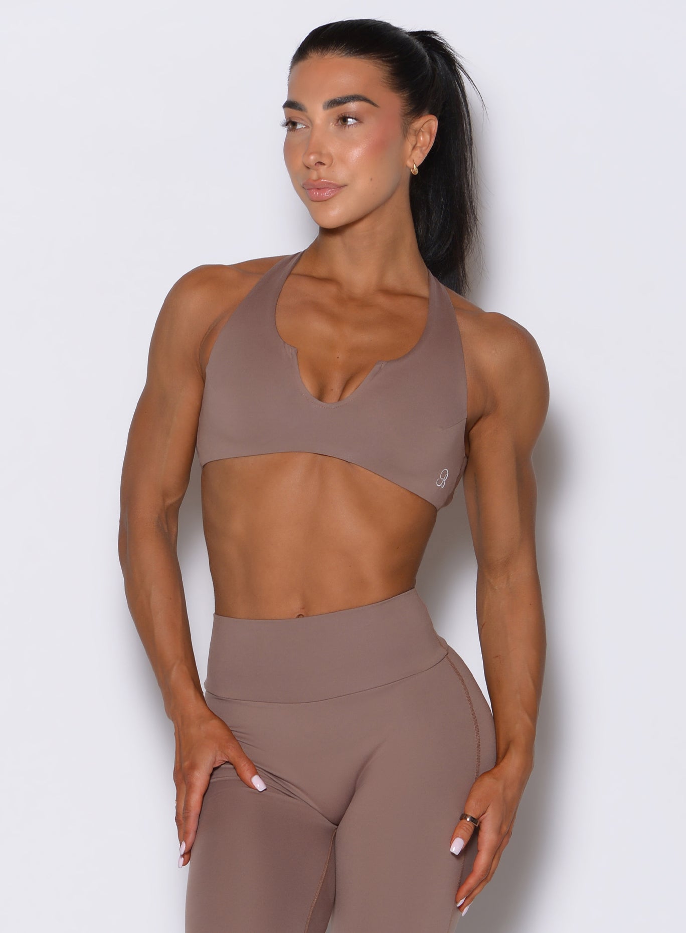 Cocoa Ace Bra with curved neckline support and smooth compression fit for strength-focused workouts