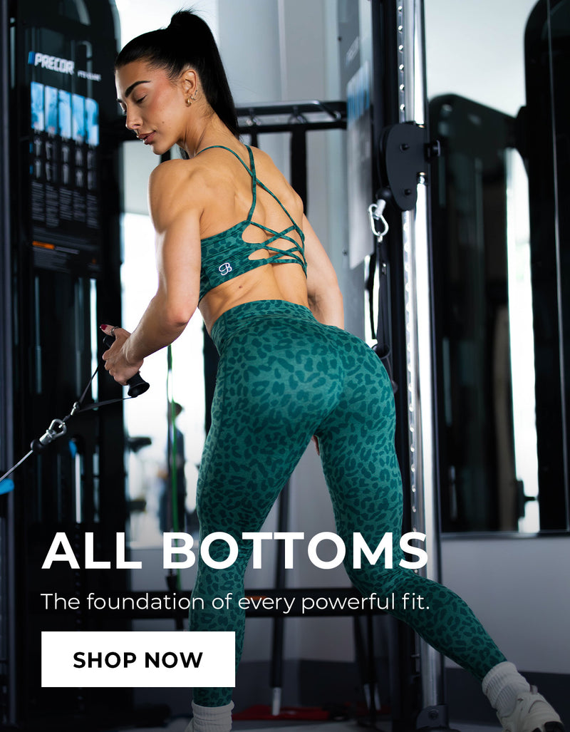 Woman working out in gym wearing green Cheetah print athletic wear with text about bottoms saying "ALL BOTTOMS the foundation of every powerful fit SHOP NOW"