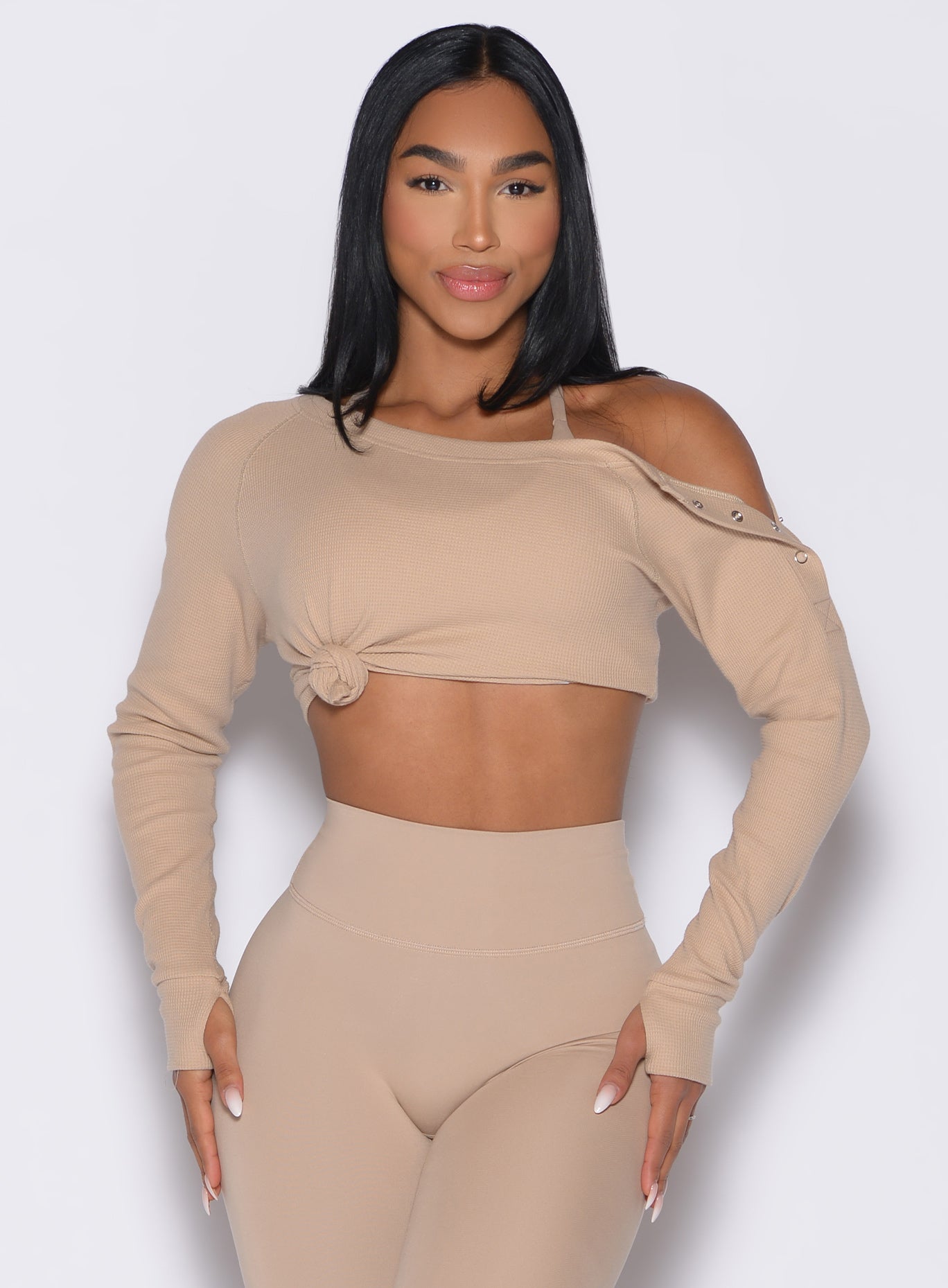 Glacial Beige Allure Pullover featuring soft waffle knit and snap shoulders for a chic gym layer.
