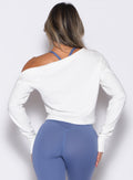 back profile view of a model wearing the Allure Pullover in White color