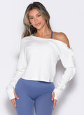 front profile view of a model wearing the Allure Pullover in White color