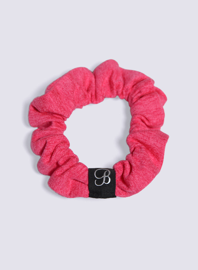 B Scrunchie in neon flame color viewed from the top
