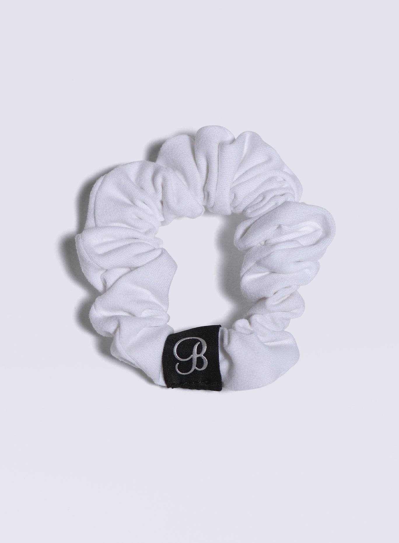 B Scrunchie in white color viewed from the top