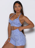Front left side profile view of the model wearing our Backless Bra in Leopard Baby Lavender.