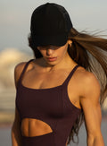 Black B Active Hat features a structured crown, silicone logo, and breathable mesh back.