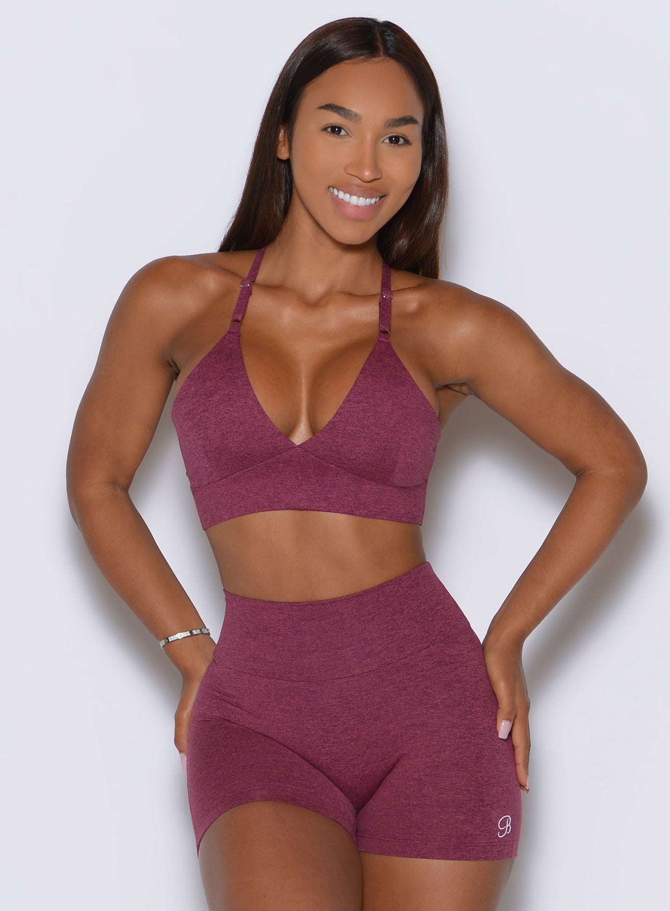 Wide underband balances the plunging neckline for a confident, sculpted Raspberry Red look