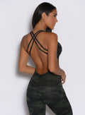 close up back profile view of a model wearing the Bombshell Bodysuit in Green/Black camo color