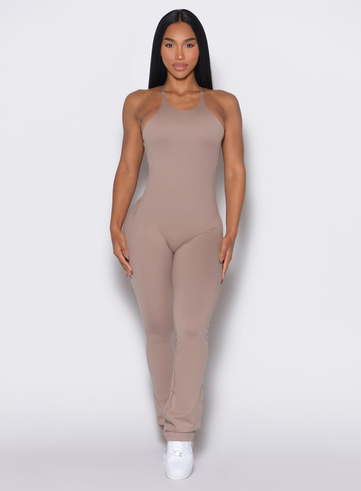 Clay Bombshell Bunny Bodysuit with a high neck and flared legs for a sculpting gym-to-street fit.