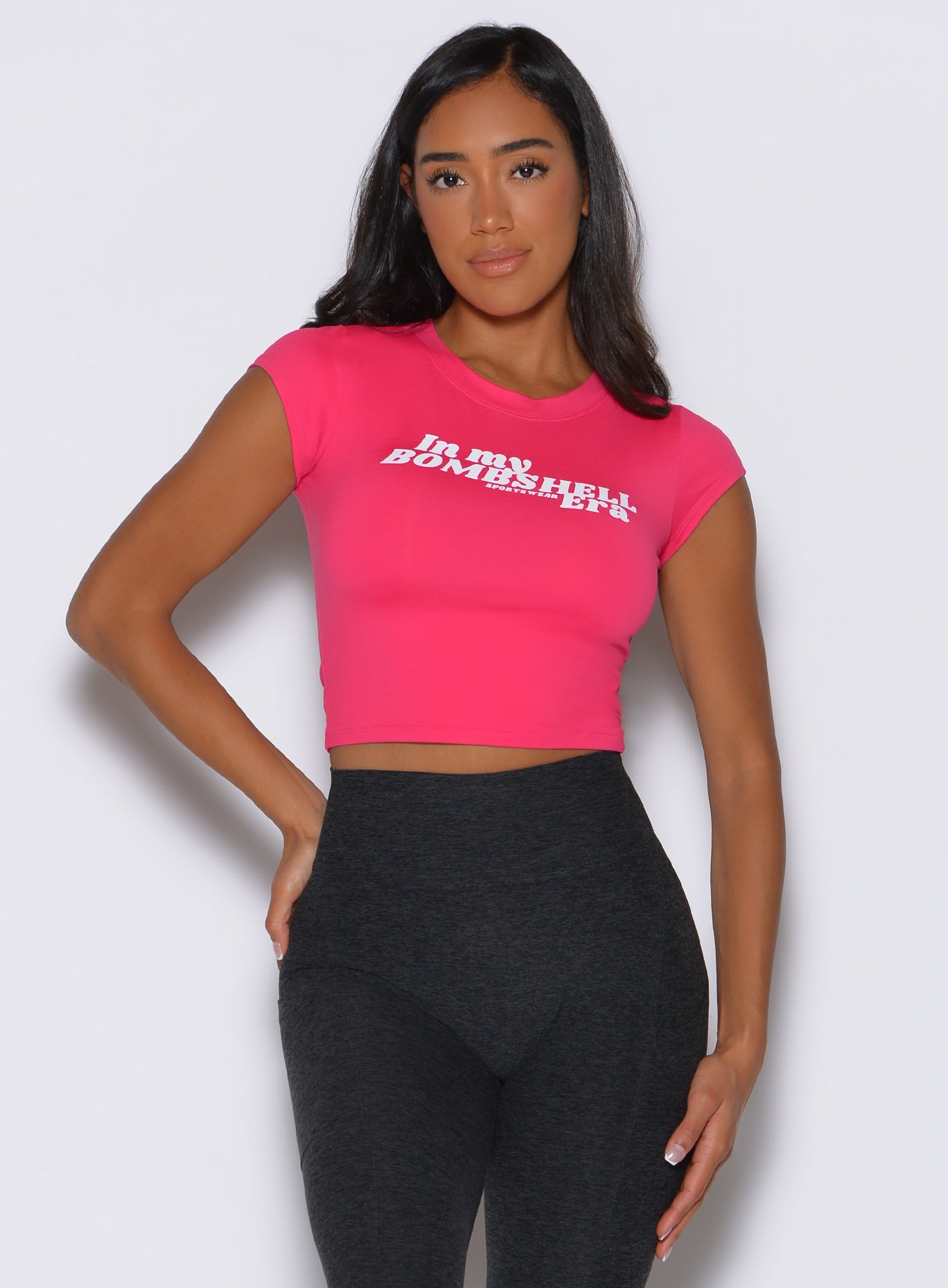 Tapered Bombshell Era Tee in Victory Ruby with cap sleeves for a soft, breathable gym-to-street fit.