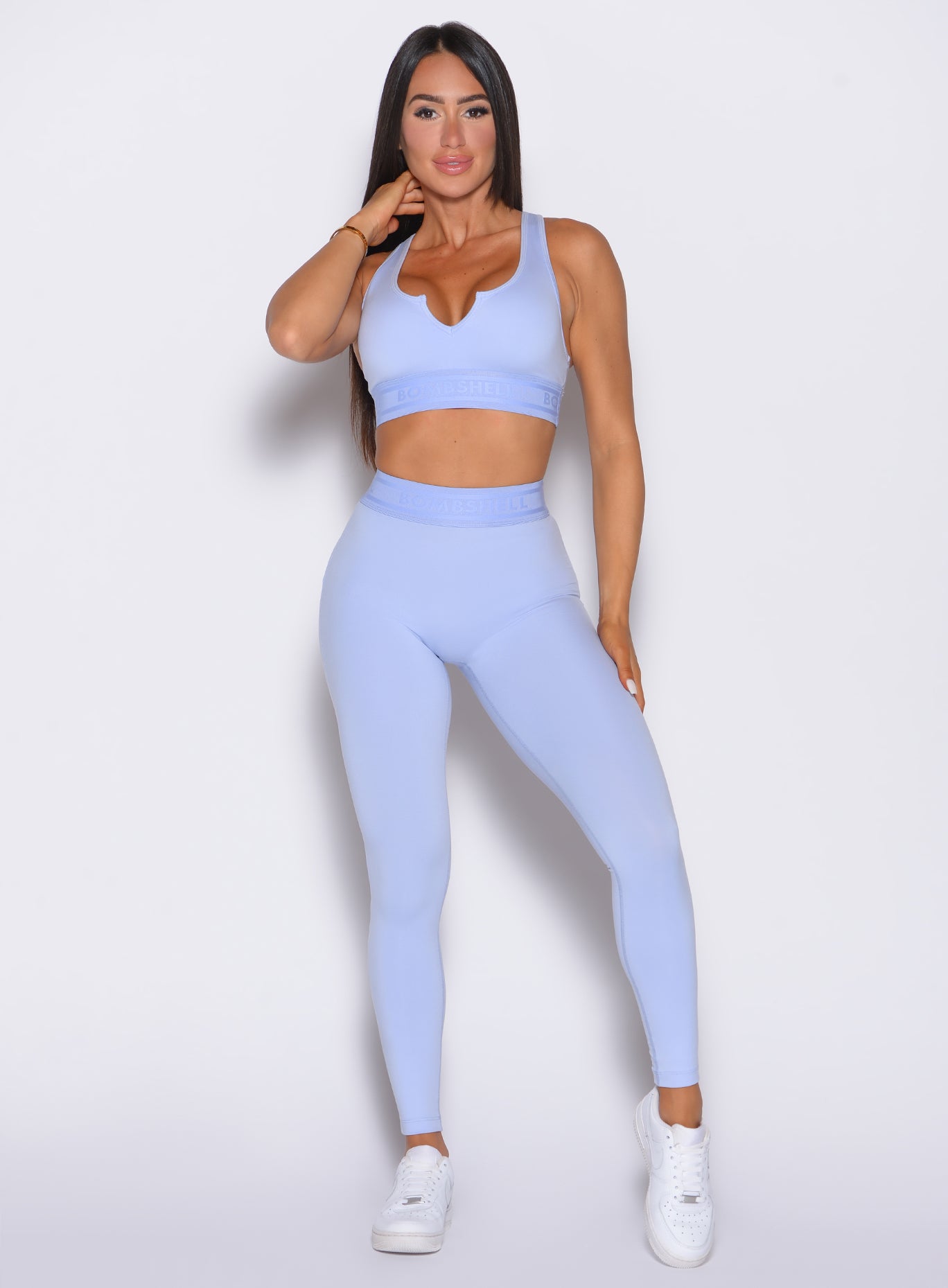Bombshell Active Leggings in Baby Lavender; mid-waist, branded elastic band for gym support.