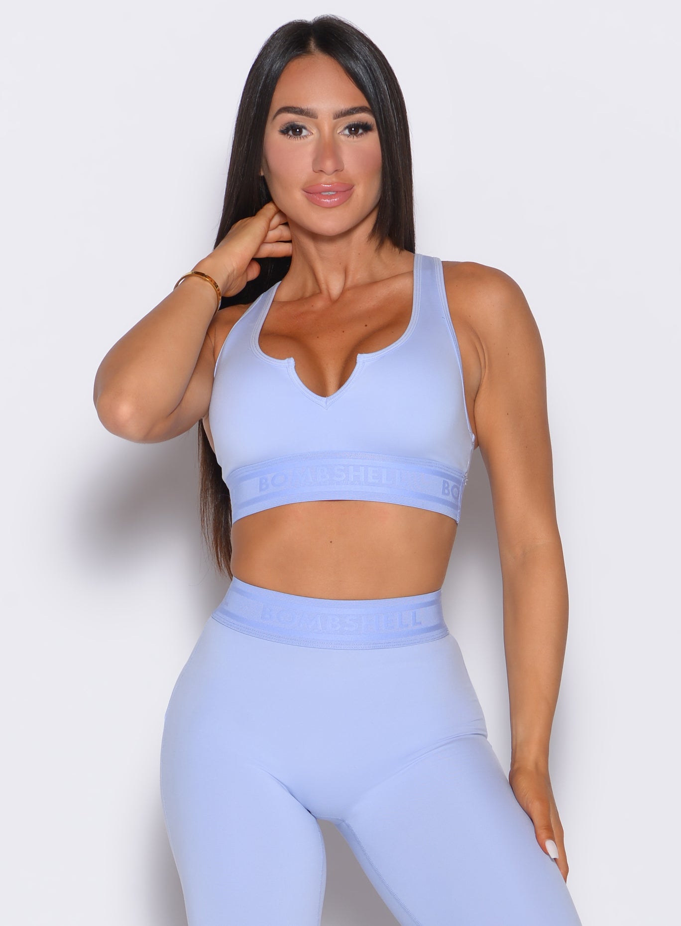 Baby Lavender Bombshell Active Bra with branded logo elastic and a supportive racerback fit.