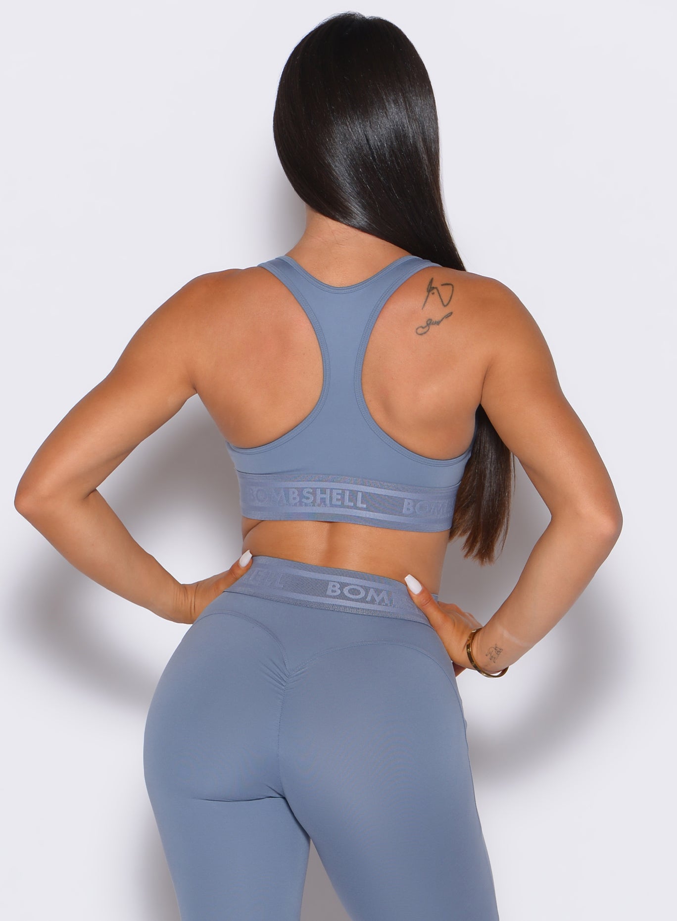 Flinstone Blue Bombshell Active Bra with supportive racerback and branded elastic band.