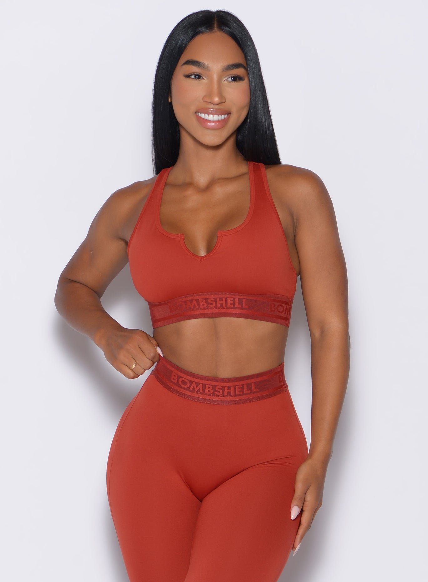 Red Ochre Bombshell Active Bra with V-cut front and logo elastic for high-impact back day training.